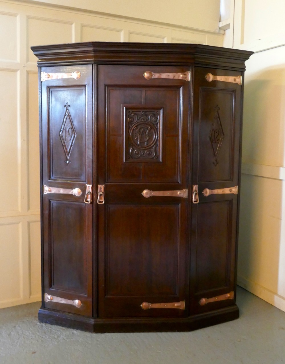 large arts and crafts hall wardrobe made by gillow for liberty
