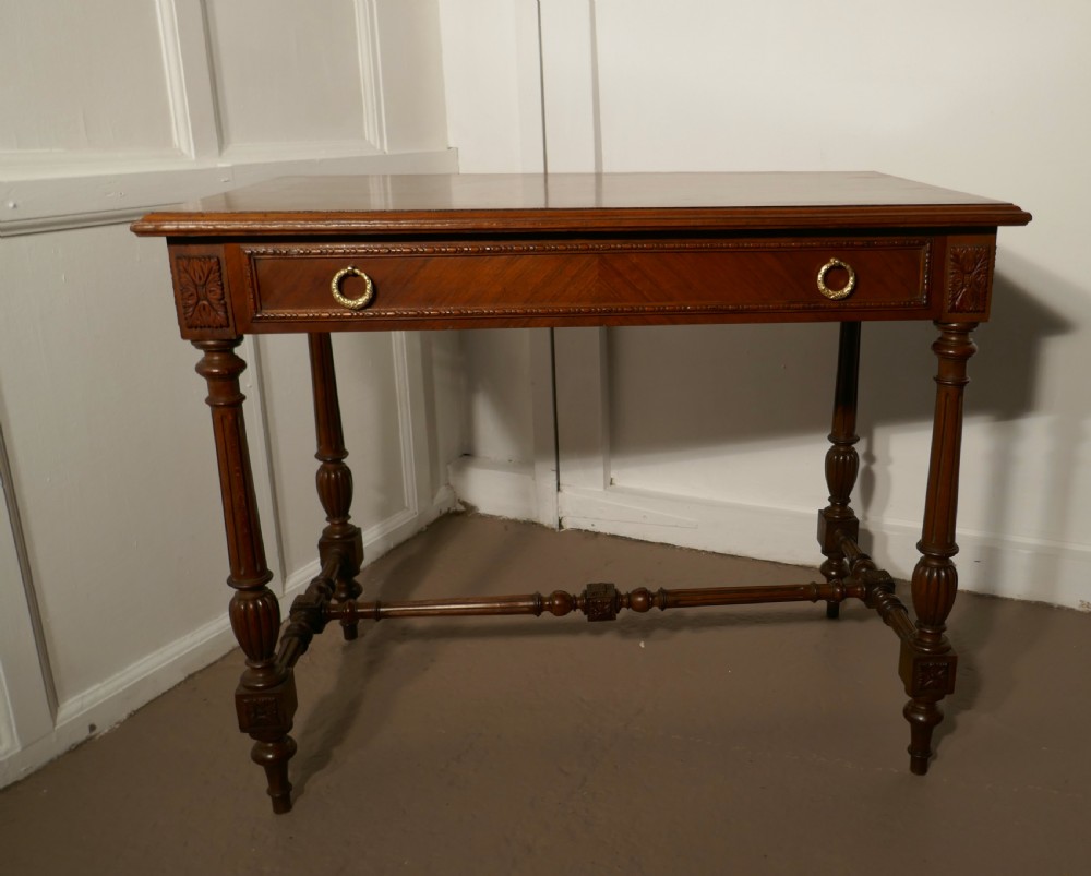 an elegant edwardian mahogany writing table