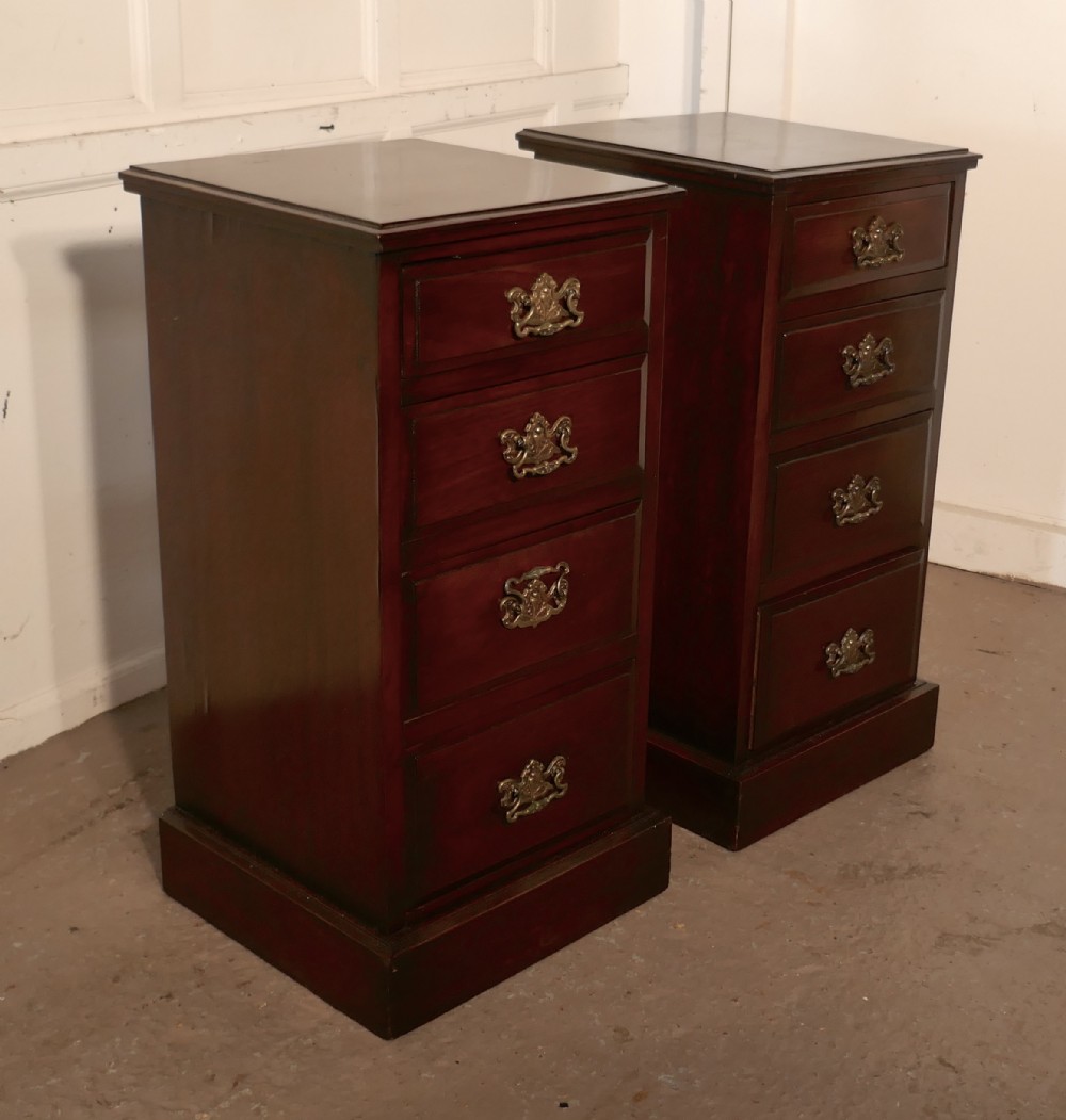 a pair of georgian style mahogany bedside chest of drawers