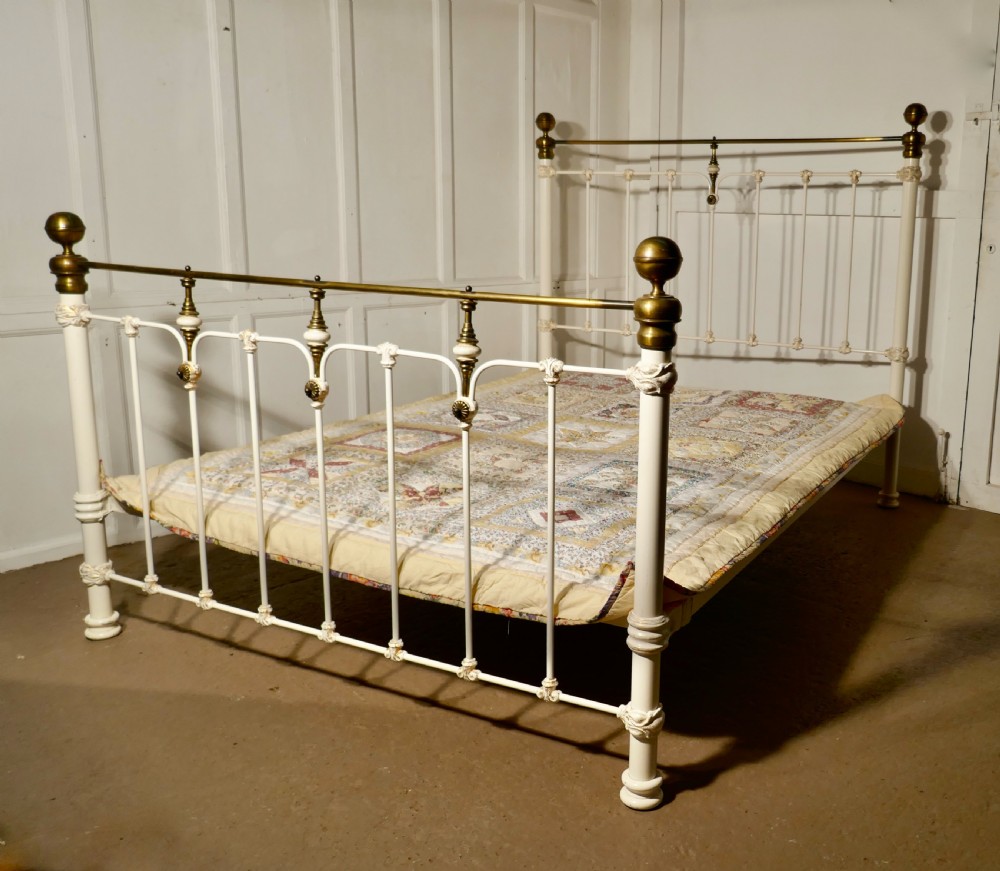 a good quality brass and iron king size 5ft wide bed