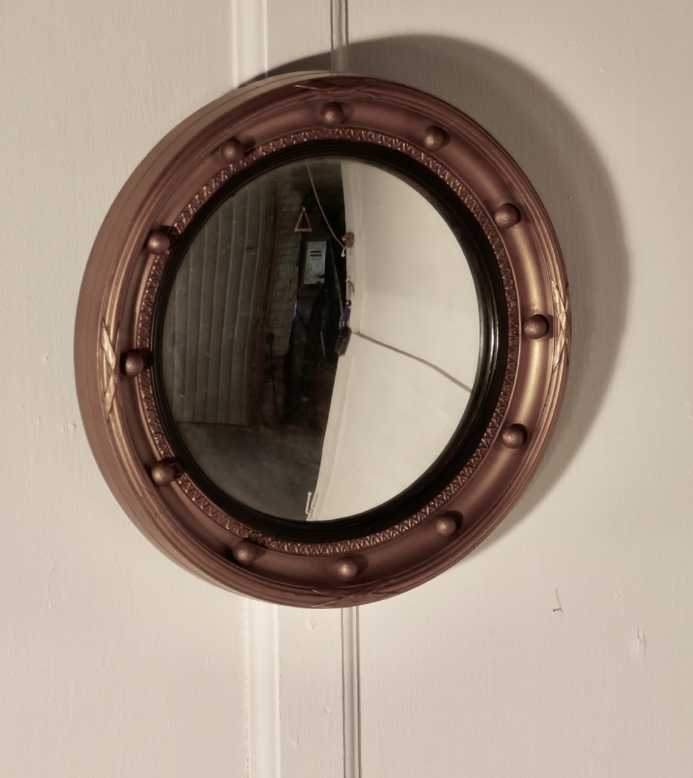 regency convex gilt wall mirror