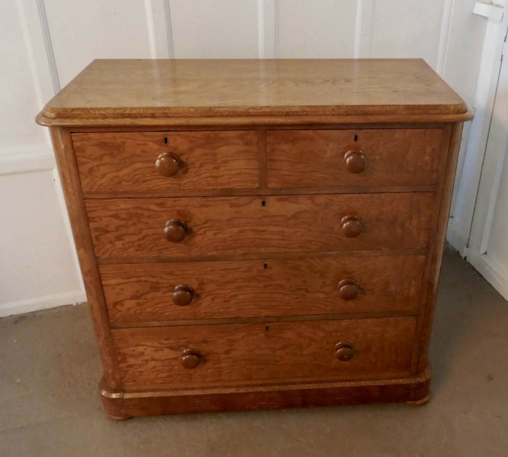 a large victorian burr ash chest of drawers