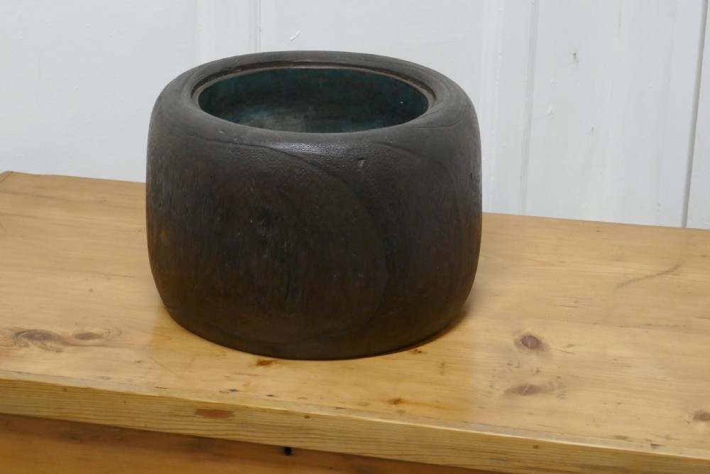 japanese sculptured wood brazier with copper liner