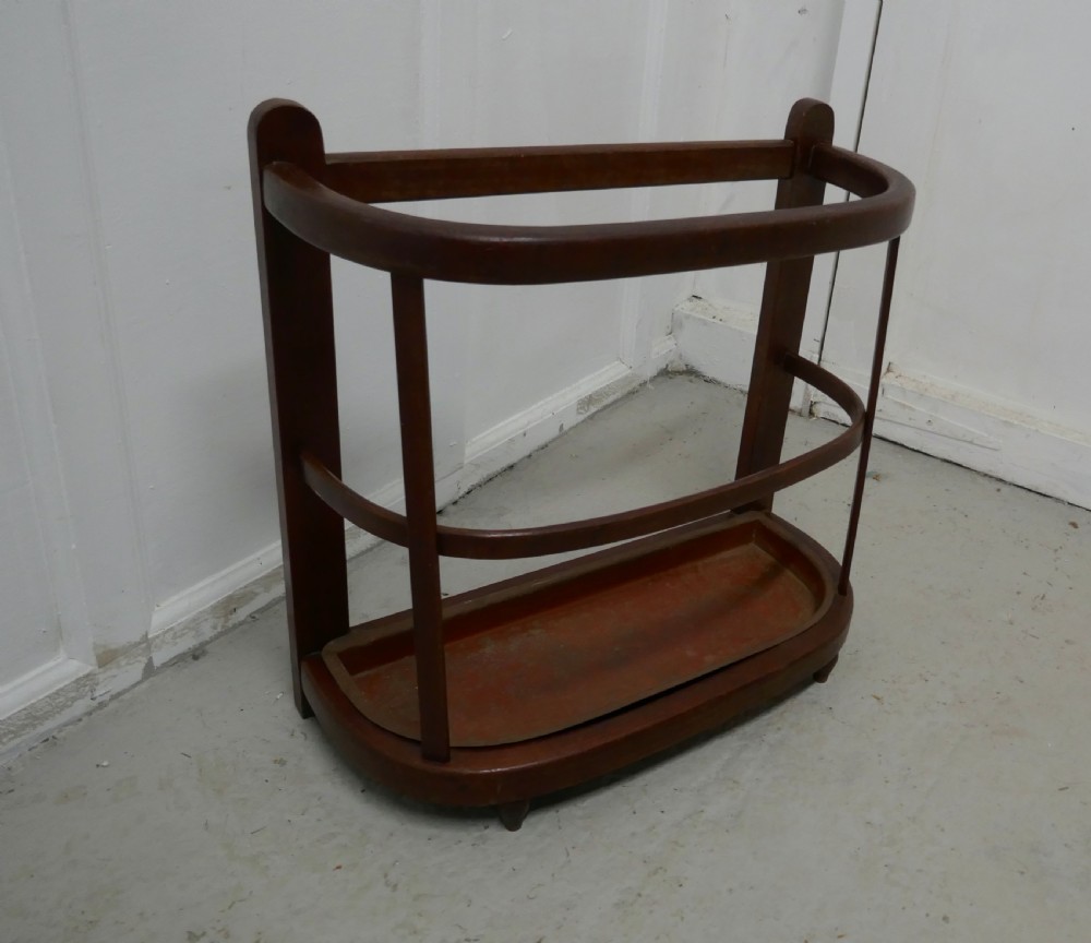a curved french stick umbrella hall stand