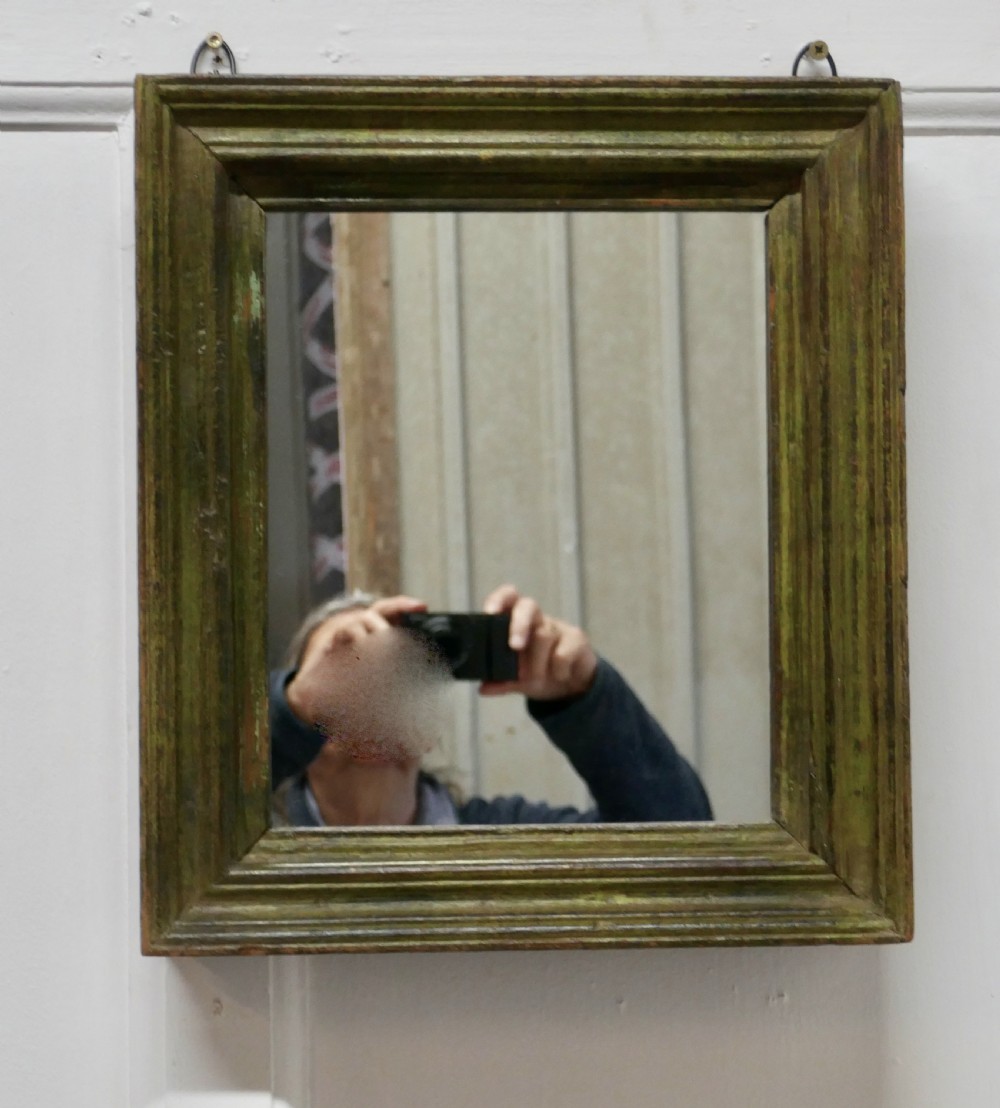 19th century french wall mirror with an old painted frame