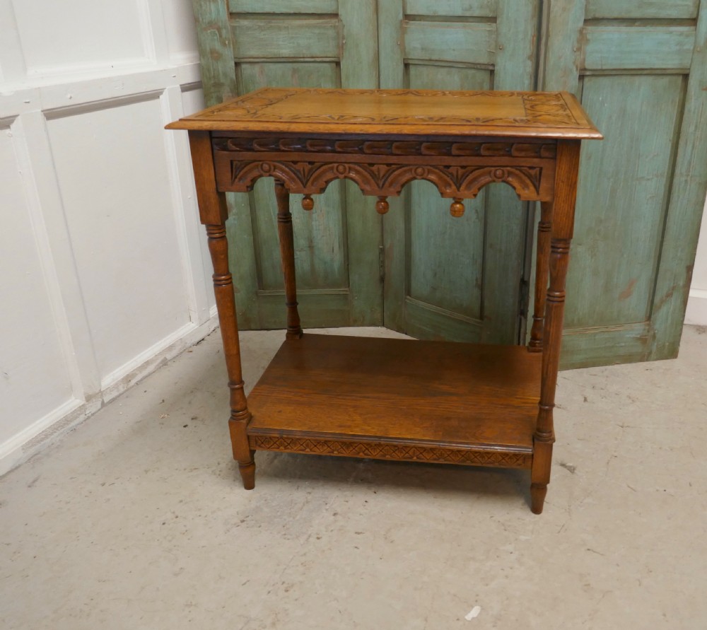 late victorian golden oak carved occasional side table