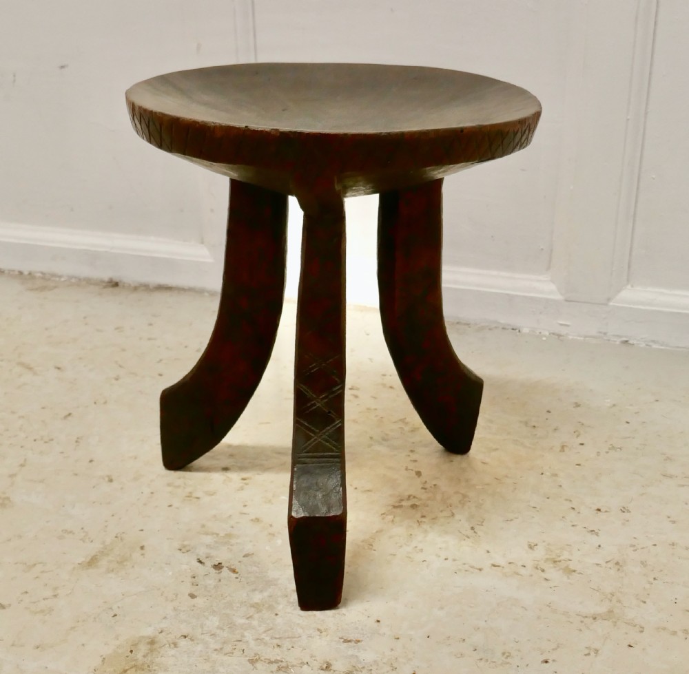 carved solid wood african 3 legged stool