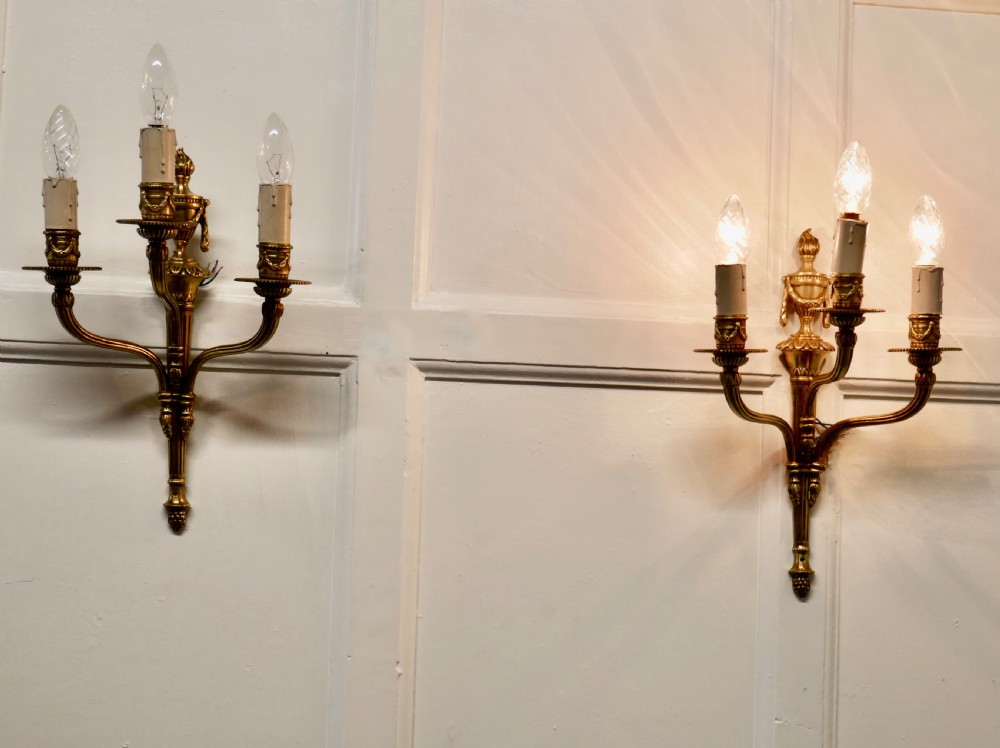 pair of french neo classical brass triple wall lights