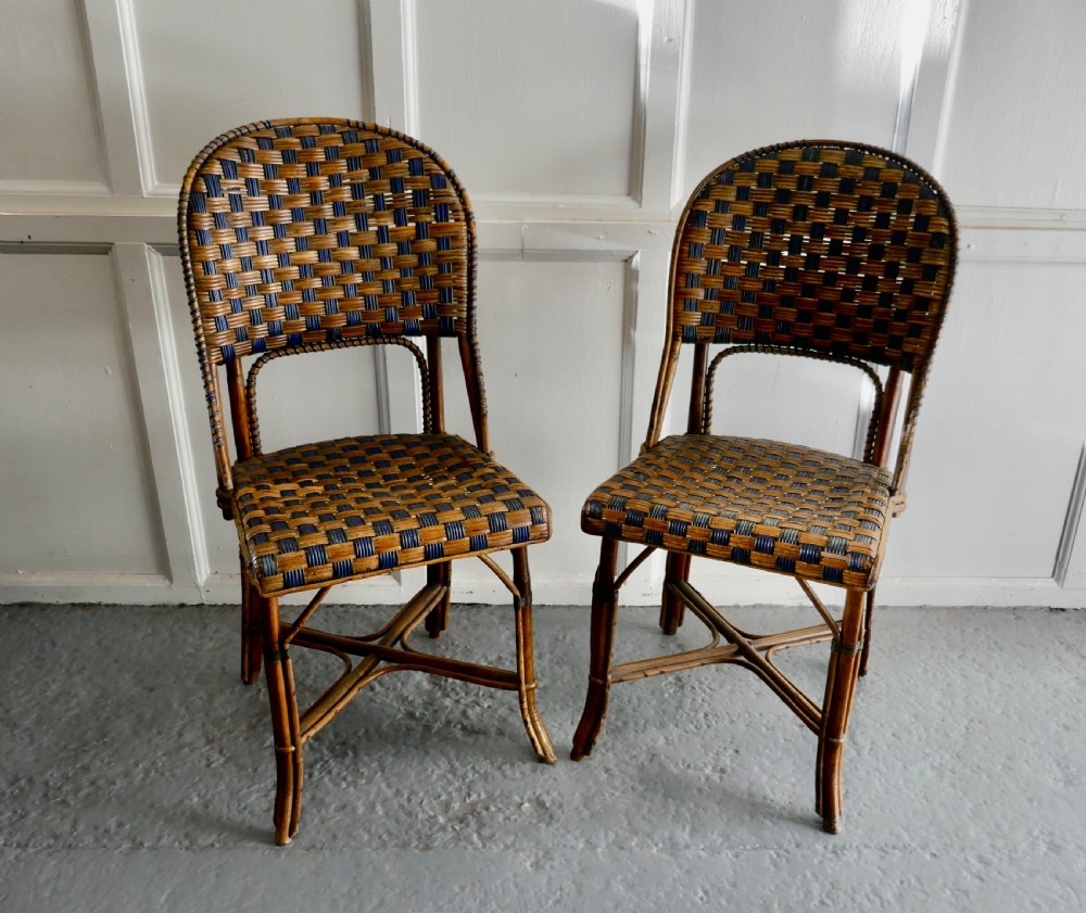 a pair of endell woven cane bentwood chairs