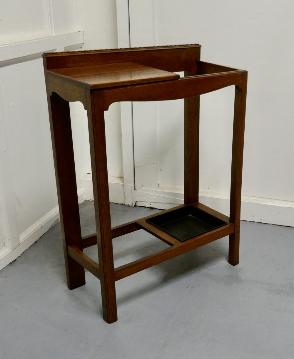 a golden oak stick stand hall table