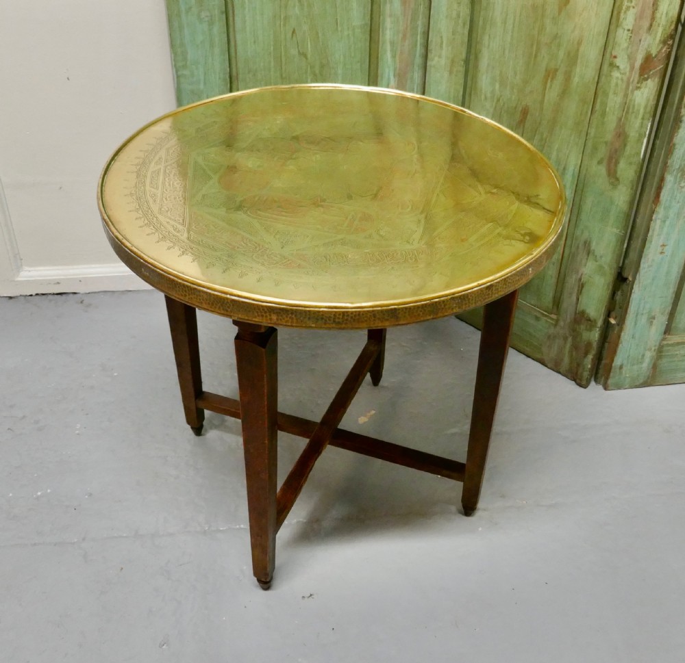 brass top coffee table or occasional table