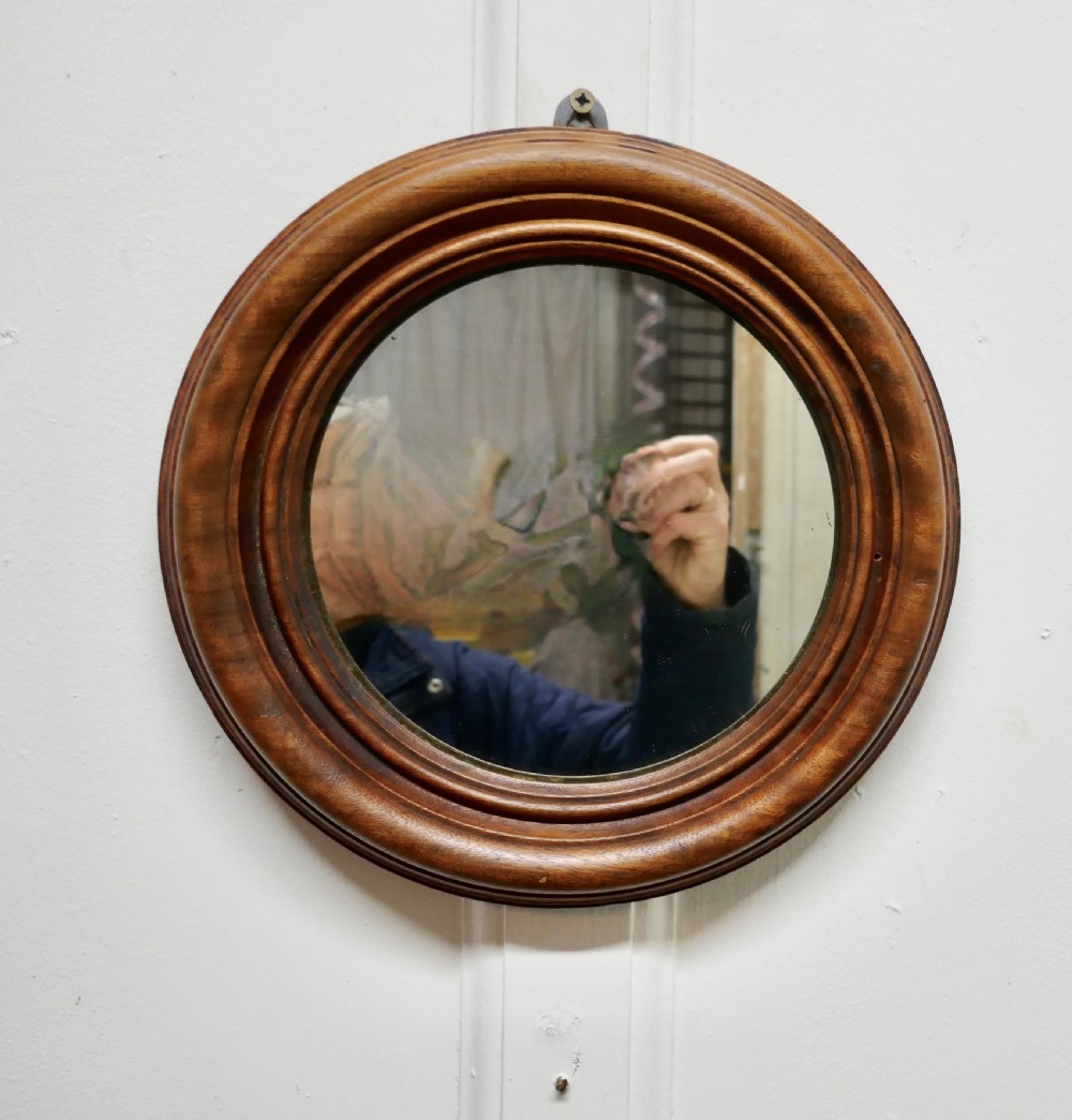 19th century small round mahogany wall mirror