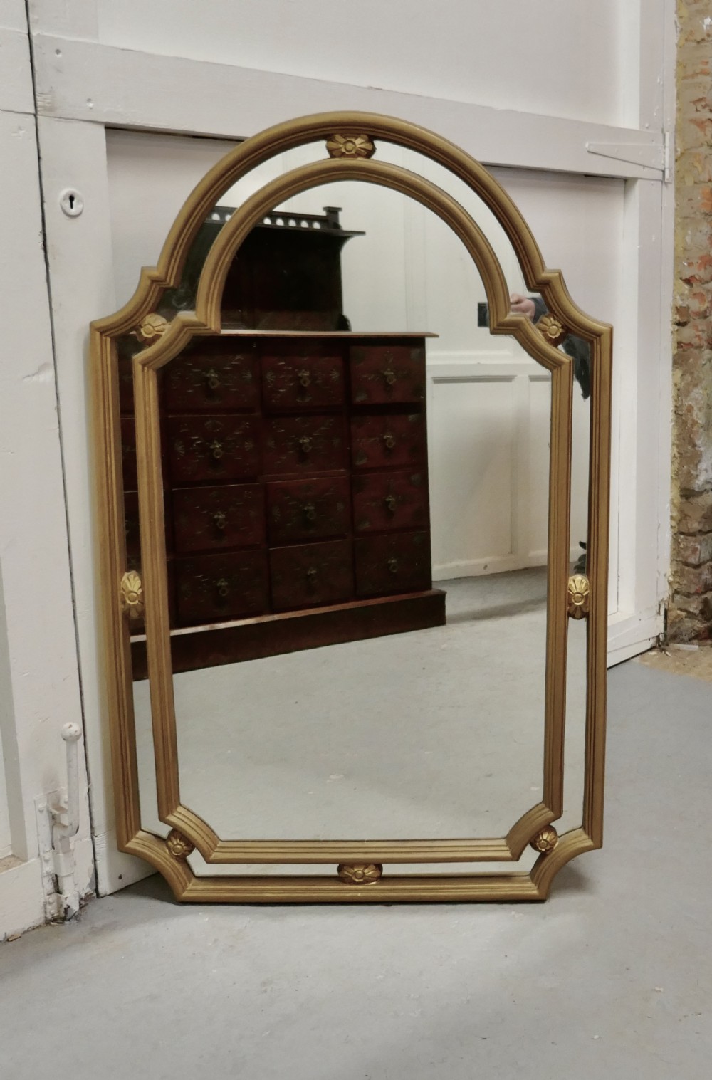 french style arched gilt cushion mirror