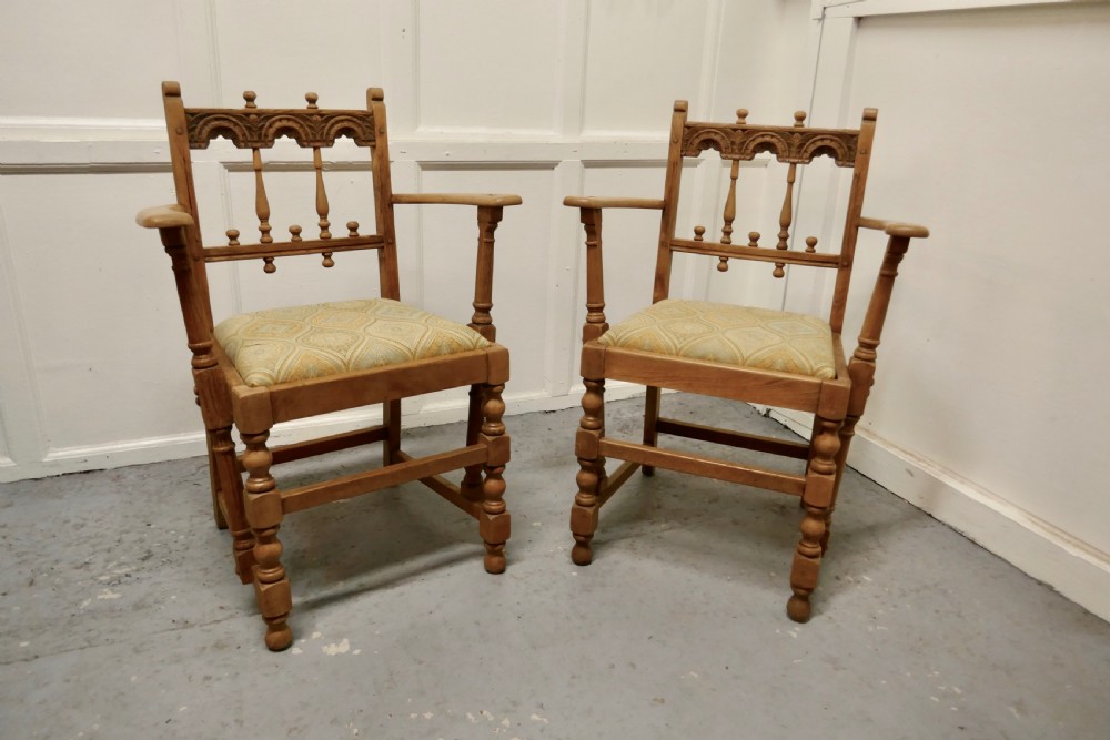pair of arts and crafts gothic bleached oak hall chairs