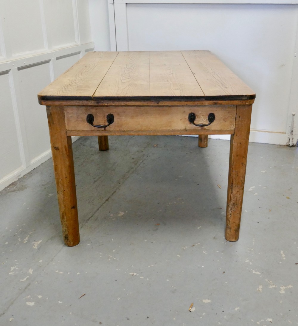 a lovely rustic pine kitchen table