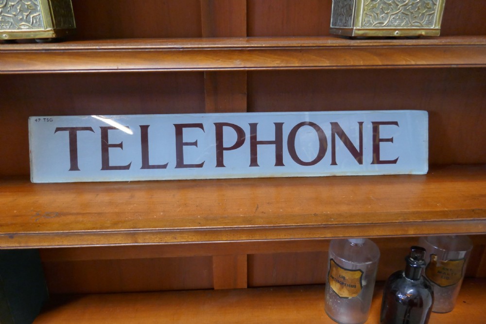 original gpo glass telephone sign from a red phone box