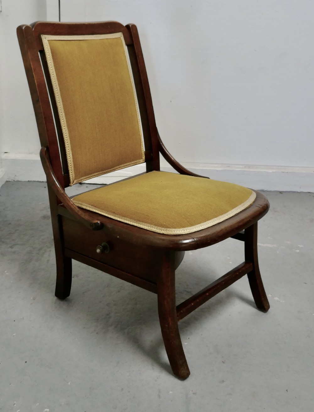 charming little chair with knitting wool drawer