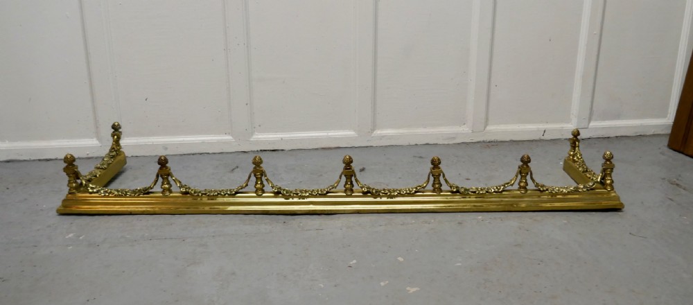superb quality and design 19th century heavy brass fender