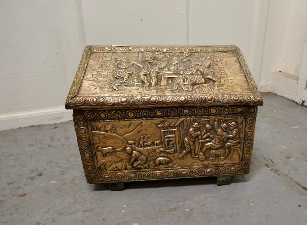 embossed brass log box with country scenes