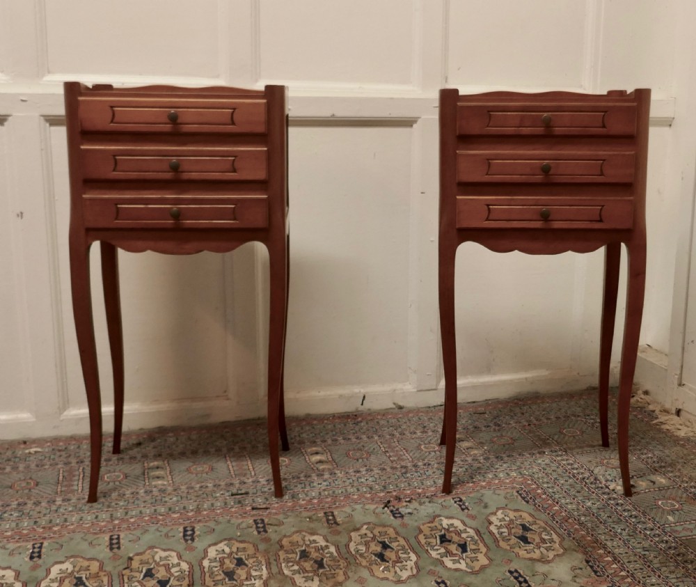 pair of french 3 drawer cherry wood bedside cabinets
