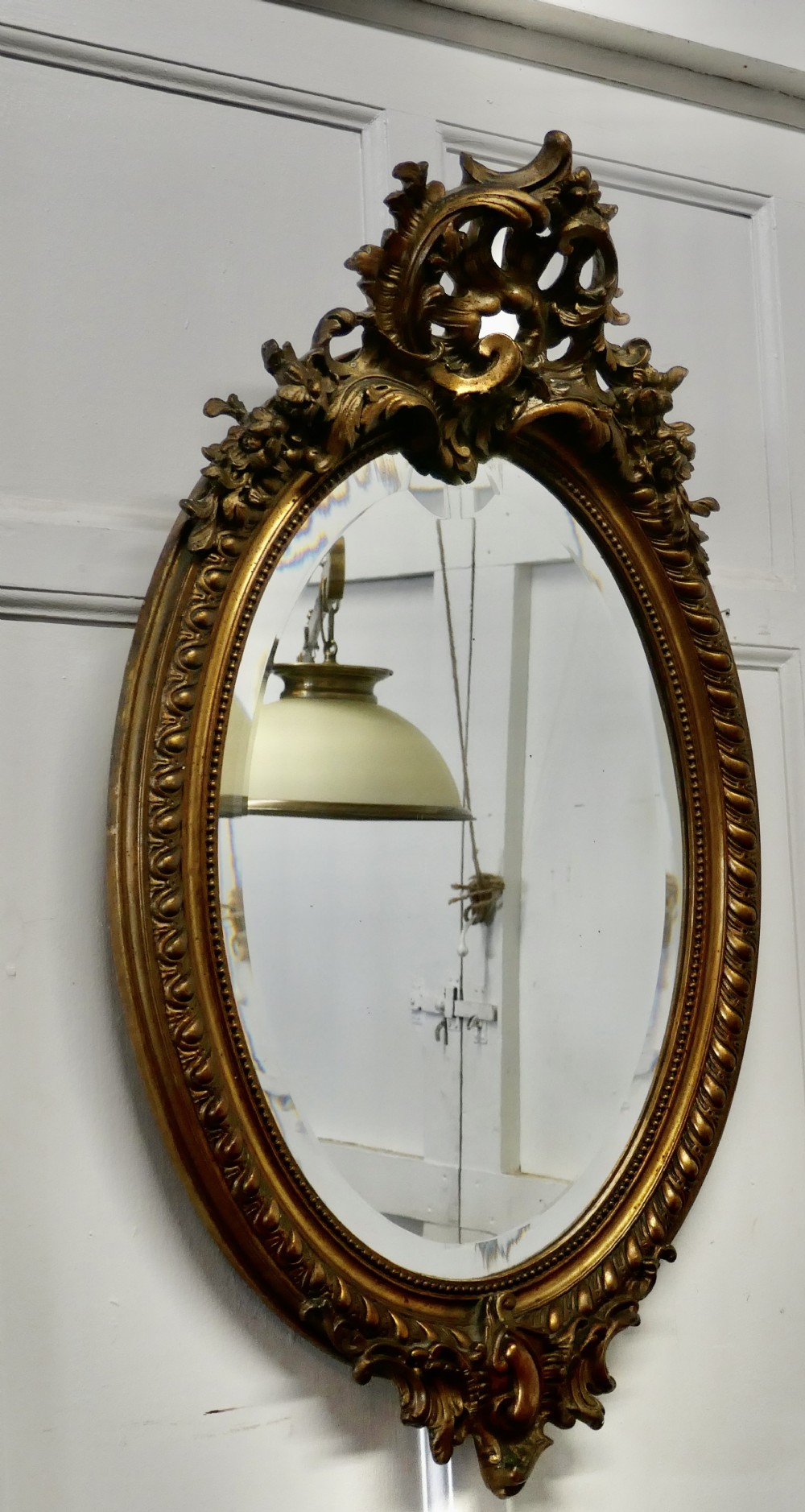 large french rococo oval gilt wall mirror