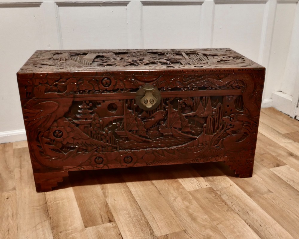 large carved oriental camphor wood chest