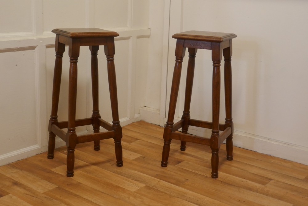 a pair of french walnut farmhouse high kitchen stools