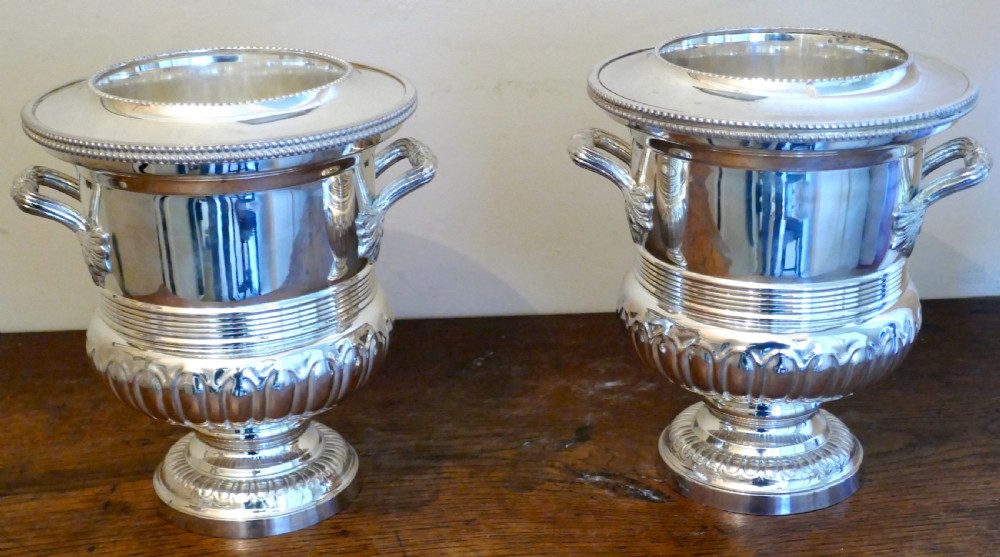 a fine pair of campana style wine coolers champaign ice buckets