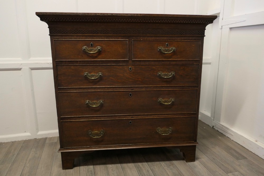 a large oak chest of drawers