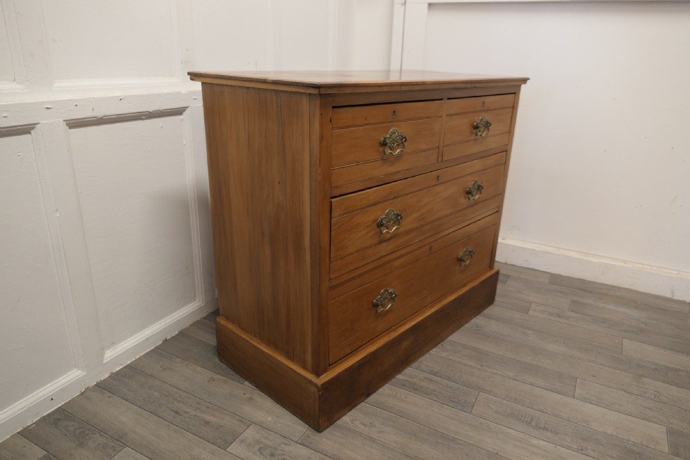 arts and crafts golden walnut chest of drawers