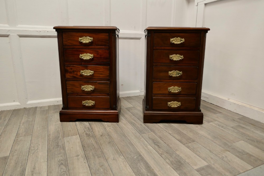 a pair of small 6 drawer chest of drawers night tables