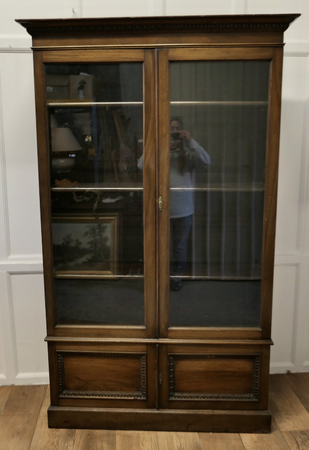 19th century tall glazed bookcase with cupboard under