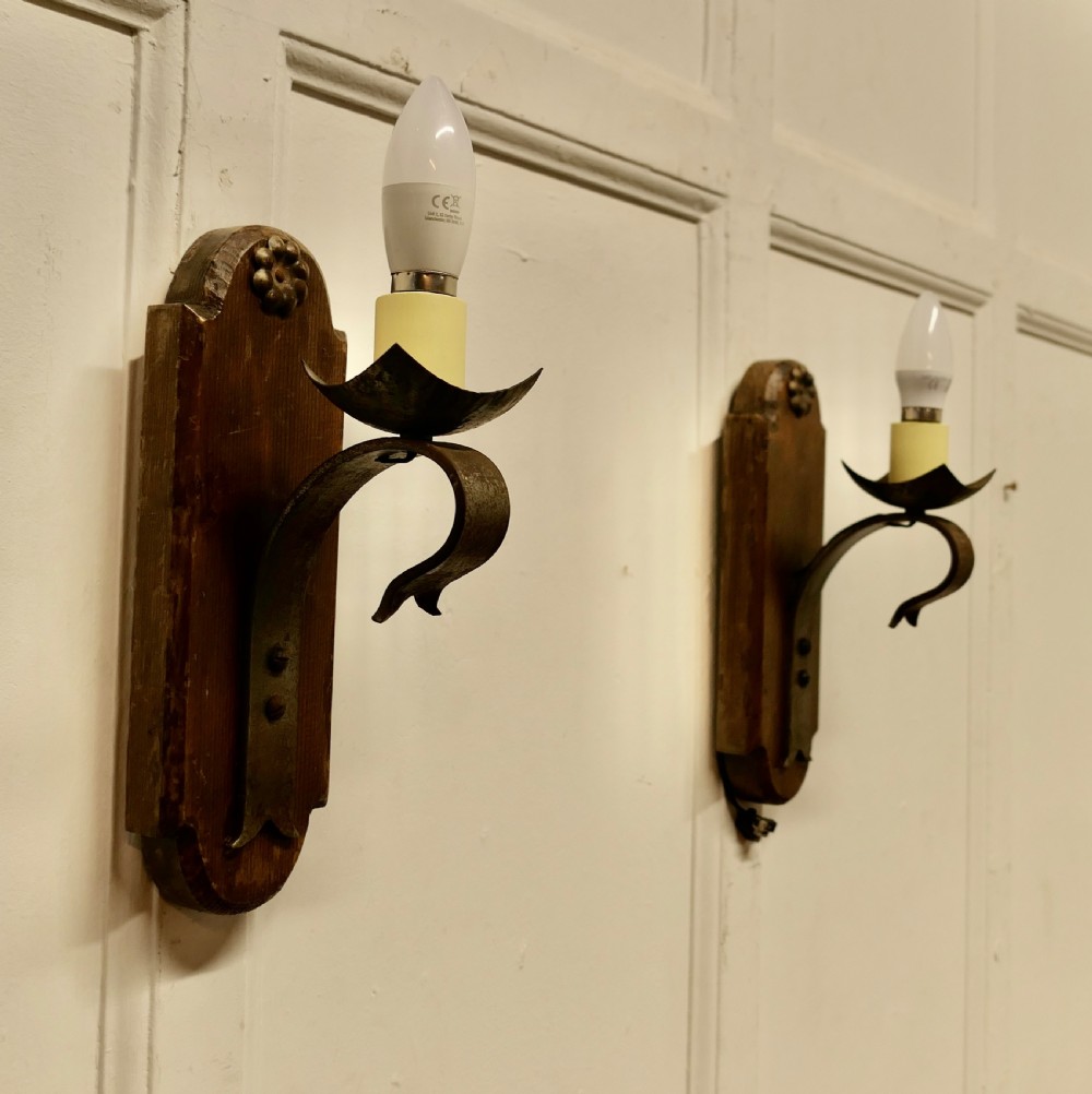 a good pair of gothic oak iron wall lights