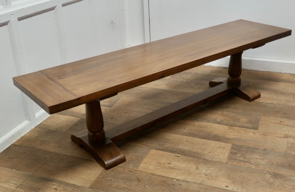 a superb very long walnut coffee table