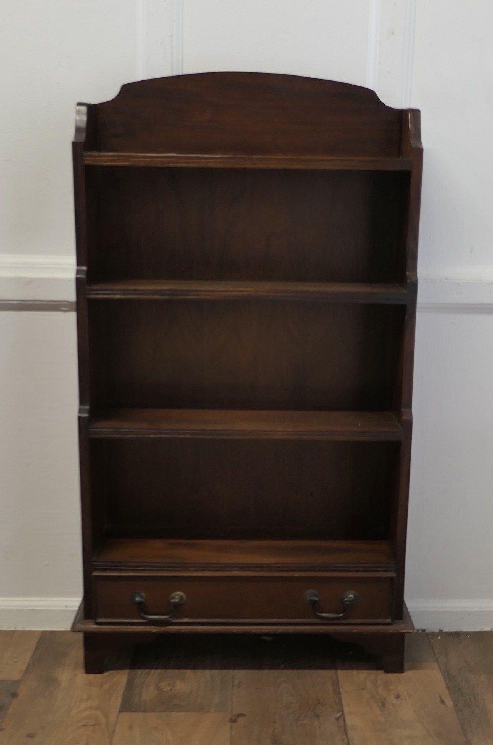 art deco walnut book case with a drawer at the bottom
