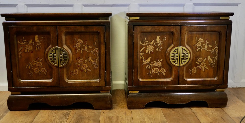 a superb pair of chinoiserie decorated side cabinets