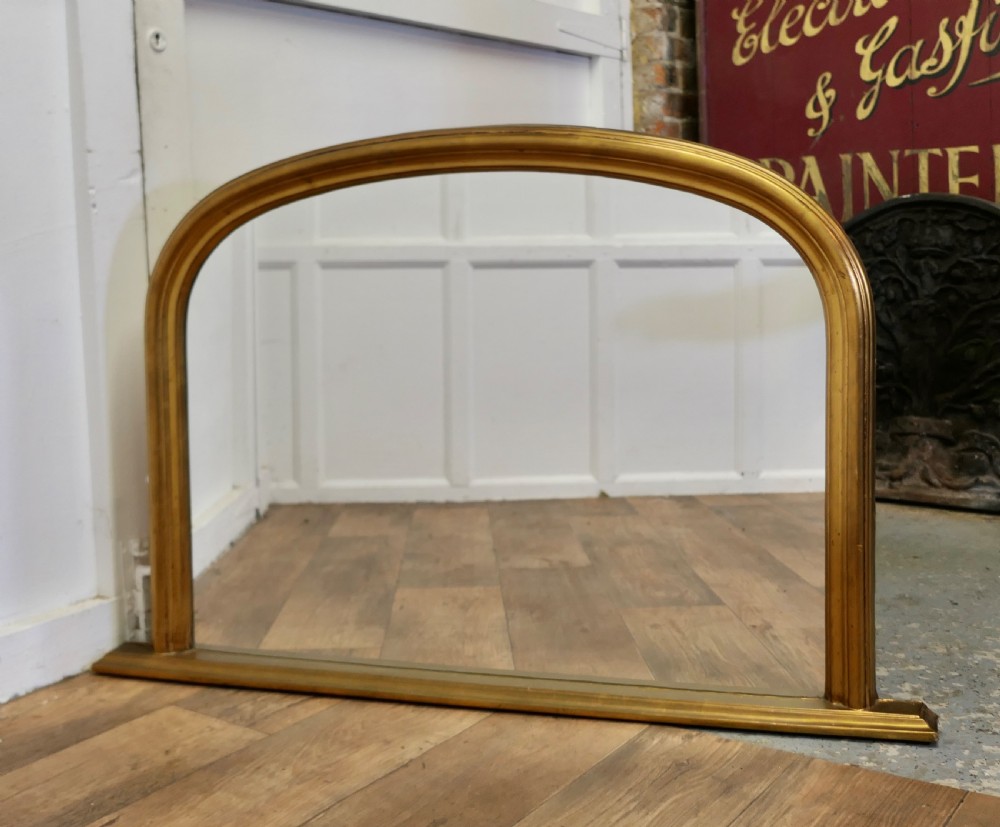 victorian style arched gold overmantel mirror