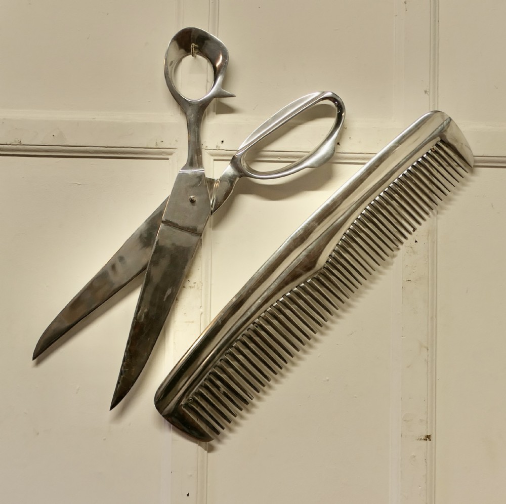 barber shop trade sign giant comb and scissors