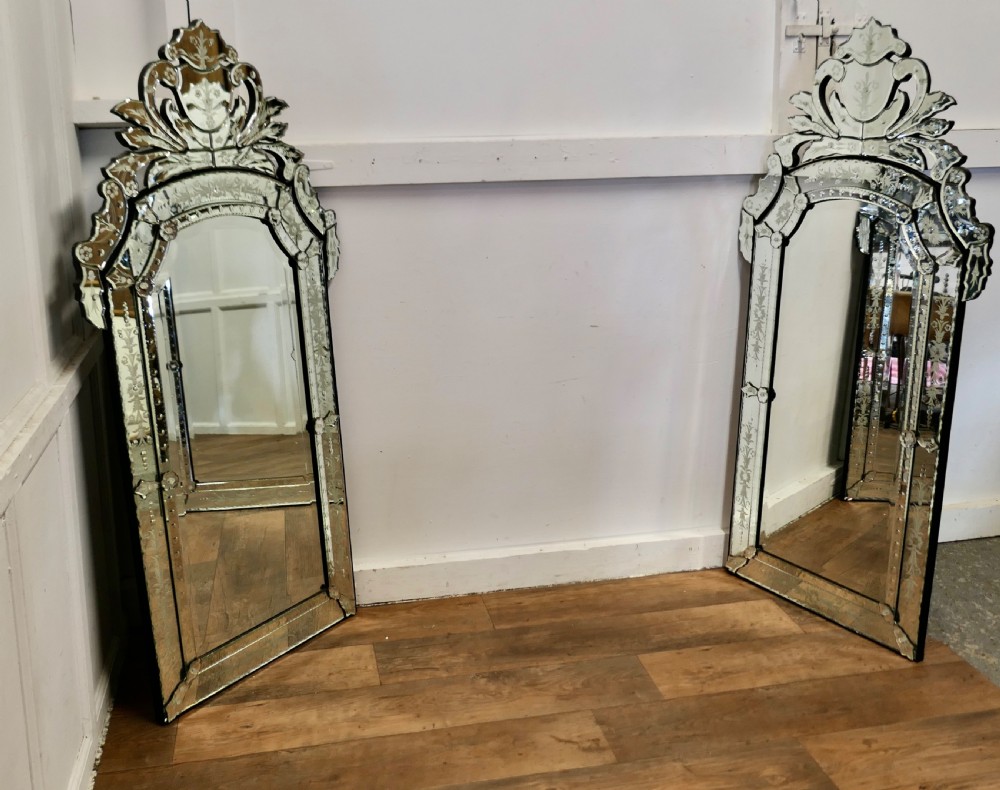 a superb pair of large venetian pier mirrors