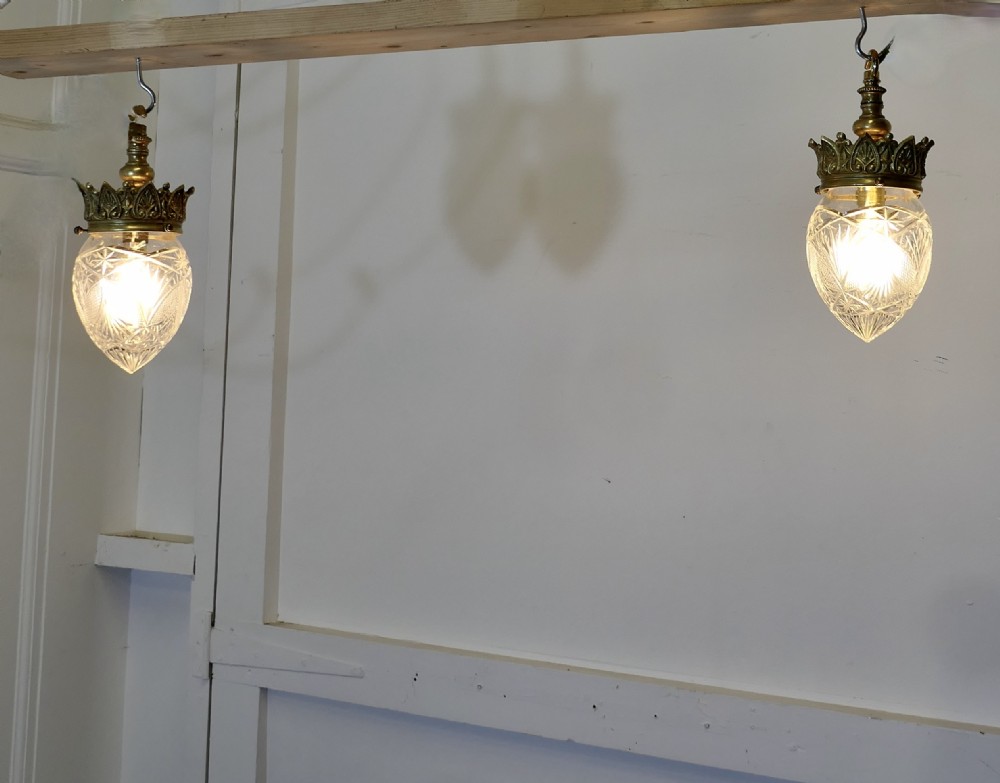 a pair of victorian arts and crafts brass ceiling lights