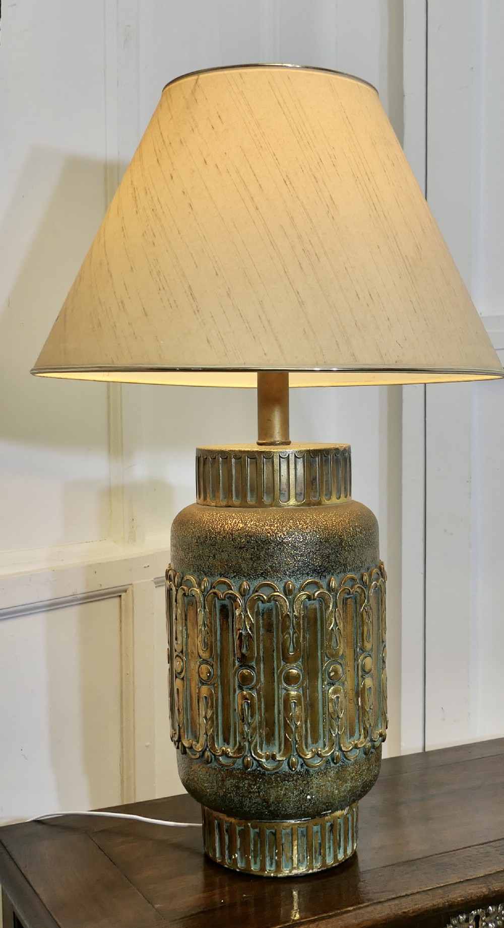 large bulbous simulated brass ceramic vase lamp