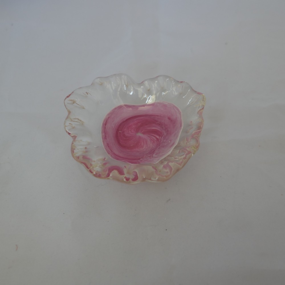 isle of wight art glass cased dish in shades of pink with a ruffled top