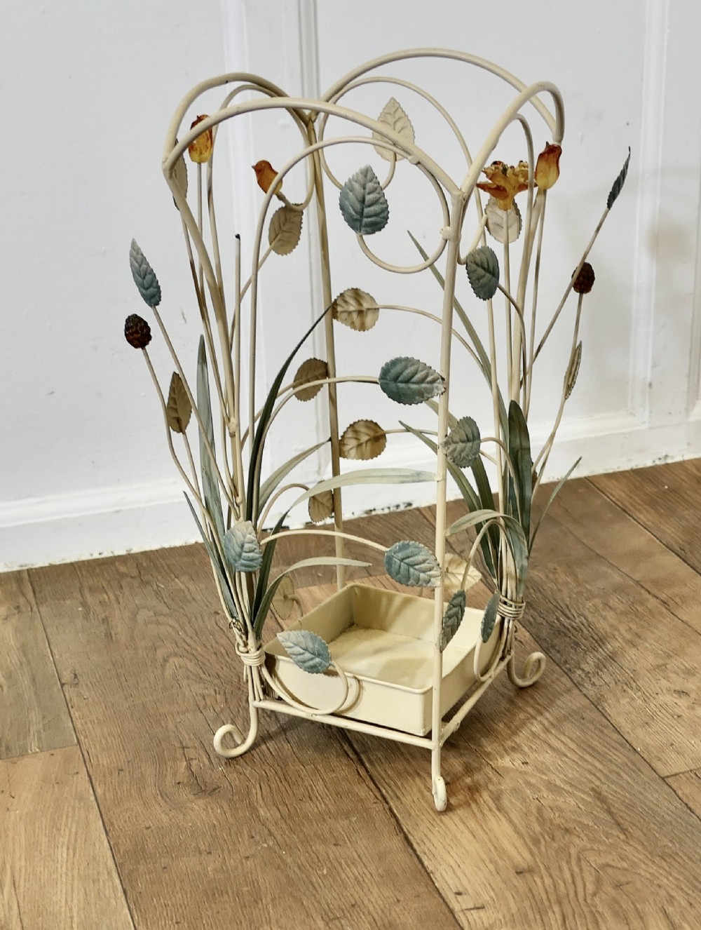 a charming french wirework umbrella stand