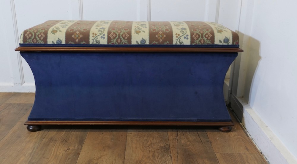 a large regency upholstered ottoman or window seat