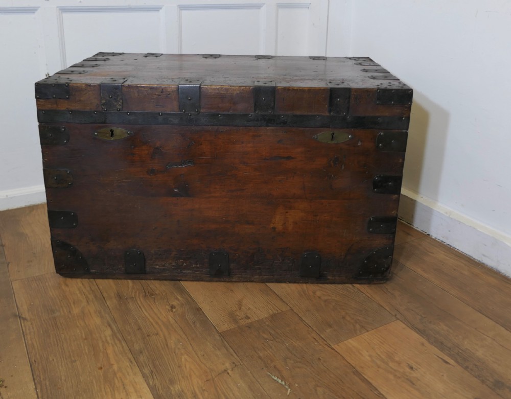 large lined iron banded travel trunk made by h d dean