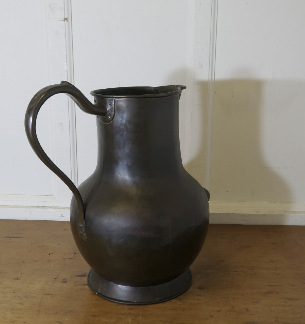 lovely old tavern copper ale jug shop display