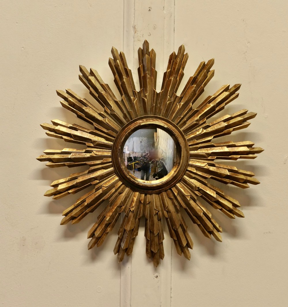 petite french art deco style sunburststarburst gilt mirror