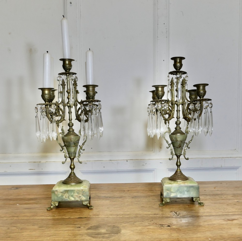 a pair of green marble and brass 5 branch candelabra