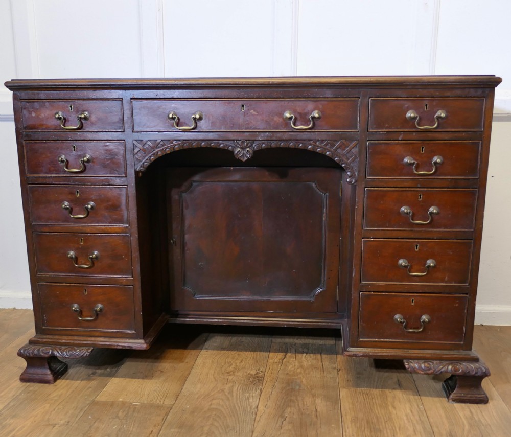 a large victorian walnut knee hole desk