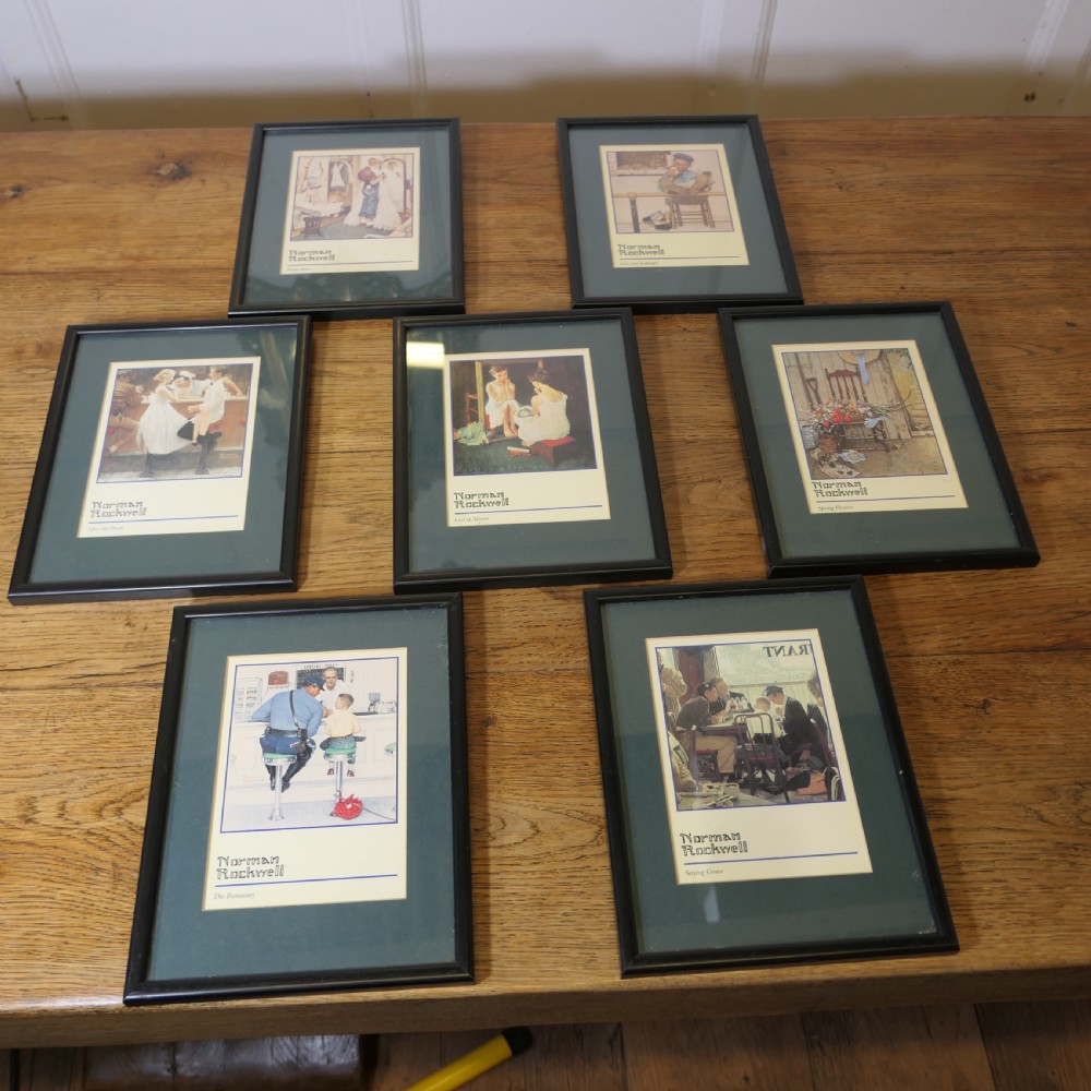 set of 7 mounted and framed norman rockwell prints